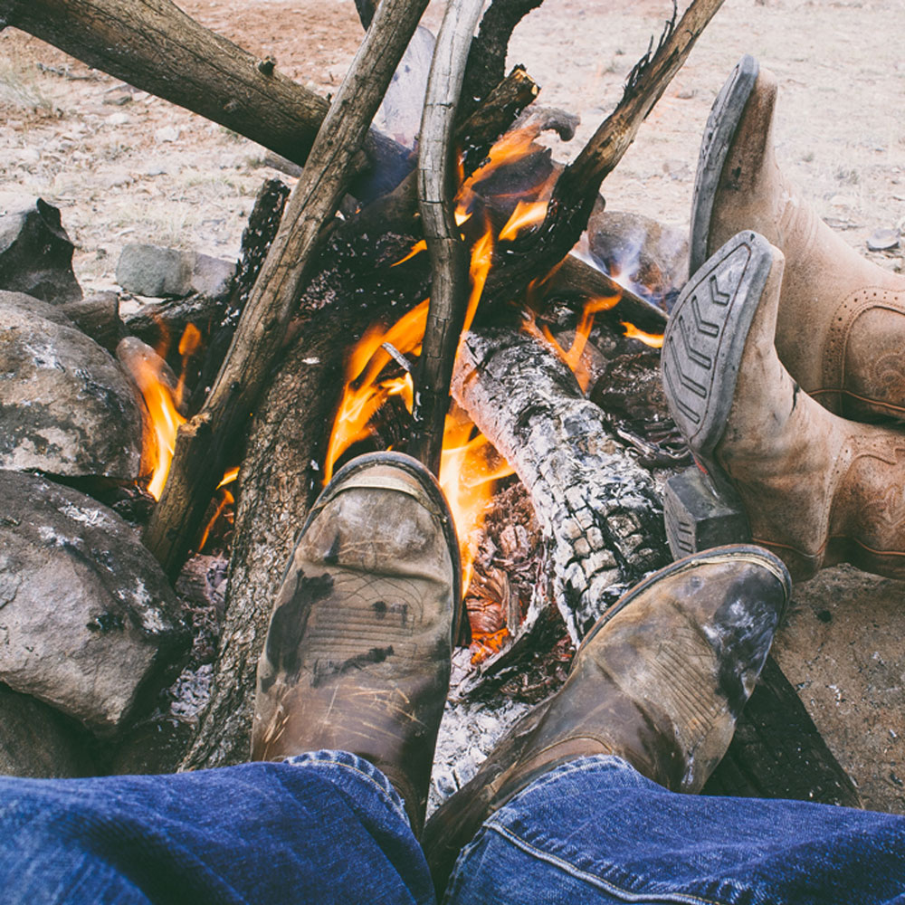 muddy cowboy boots